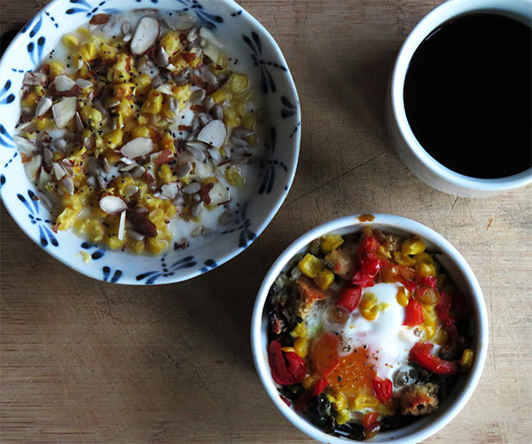 Baked Eggs in Greens With Corn and Peppers Served With Yogurt Topped With Creamed Corn and Nuts