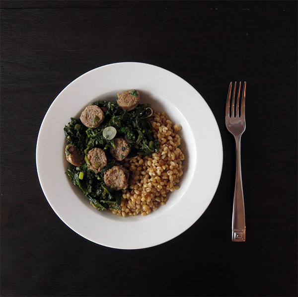 Braised Kale With Bratwurst, Garlic Scapes and Wheat Berries