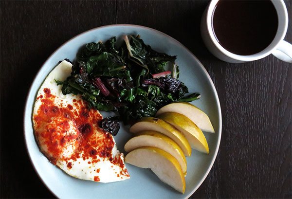 Sautéed Braising Mix, Fried Egg With Paprika, and Sliced Asian Pears