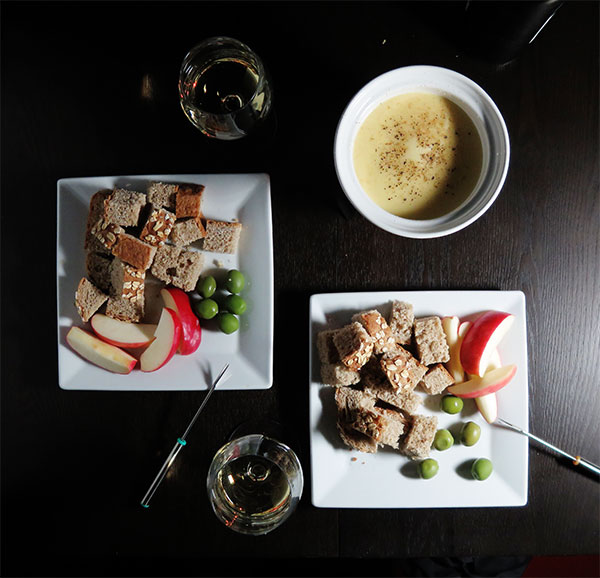 Gruyere Fondue With Bread, Apples, and Olives