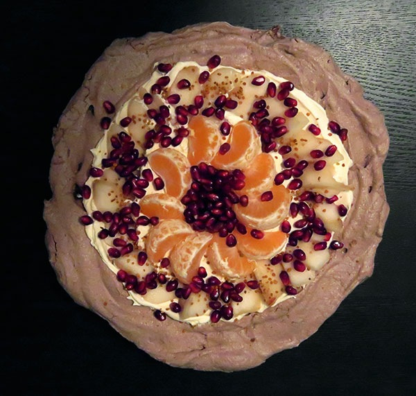 Chocolate Pavlova With Fresh Pears, Satsumas and Pomegranate Seeds