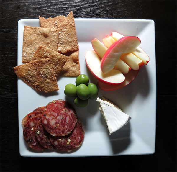 Wheat Crackers With Salami, Cheese, Olives and Apples