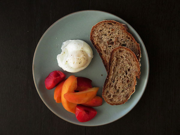 Poached Egg with Multigrain Bread and Fresh Fruit