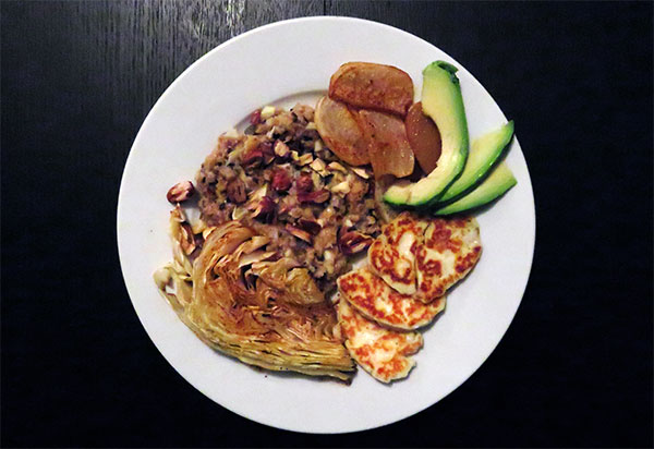 Potlatch Pilaf With Split Red Lentils, Meyer Lemon, Roasted Cabbage, Black Radish, Hazelnuts, Haloumi, and Avocado