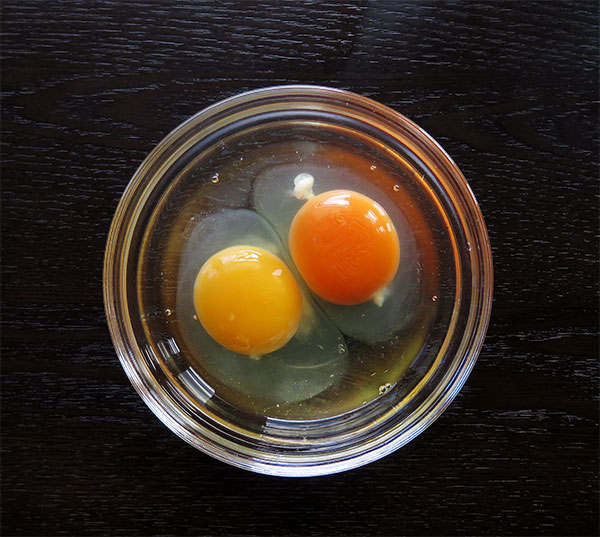 Two Cracked Farm Eggs