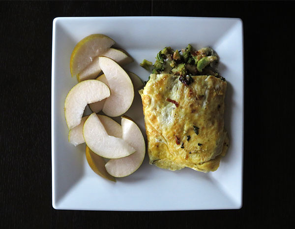 Omelet Filled With Cheese and Roast Broccoli and Leeks