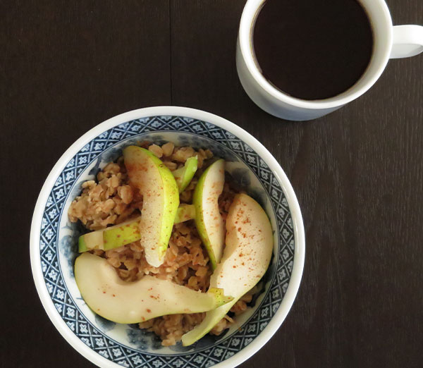 Oatmeal Made From Extra-Thick Rolled Oats and Topped With Fresh Concorde Pears and Cardamom