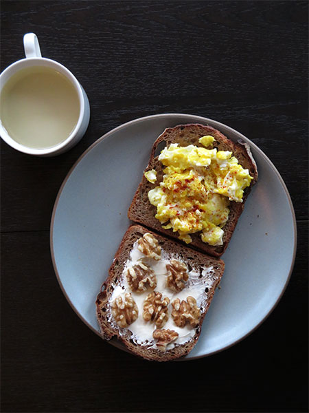 Toasts: Scrambled Egg With Paprika and Cream Cheese with Walnut Halves