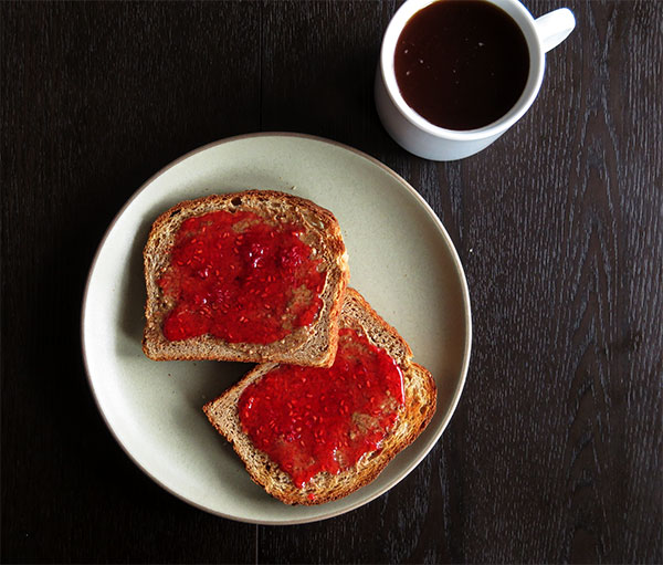 Homemade Whole Wheat Toast With Almond Butter and Raspberry Freezer Jam