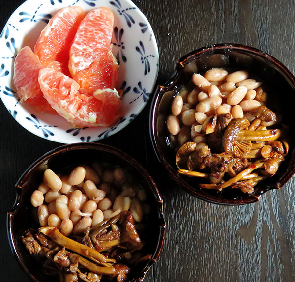 Mayocoba Beans Topped with Sautéed Wild Mushrooms Served with Pomelo